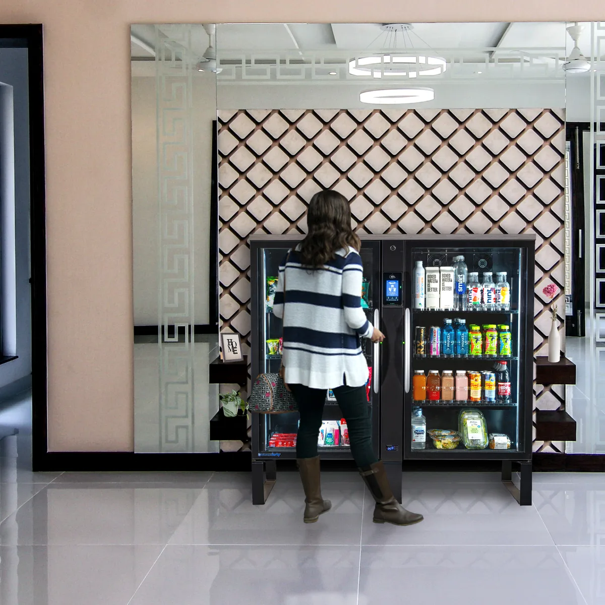 Smart cooler in a Wake County, NC workplace lobby — person browsing fresh grab-and-go food and beverage options